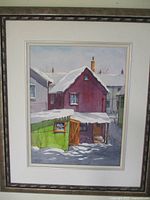 Full front view of the framed watercolor painting showing urban snowy house scene