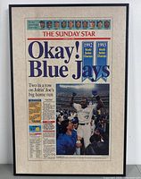 Front view of framed Toronto Star newspaper front page from October 24, 1993 showing headline 'Okay! Blue Jays' and player lineup photos.