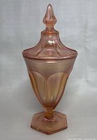 Photo of full lidded candy bowl showing tall pointed lid, petal pattern, and hexagonal pedestal base.