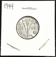 Reverse side of 1944 Canadian 5 cents coin showing large 'V' Victory symbol, torch, maple leaves and denomination/year.