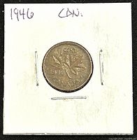Photo of reverse side showing maple leaf design, denomination 1 cent, year 1946, and 'Canada' text.