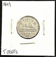 Reverse side of 1949 Canadian 5 cents coin depicting the beaver design with denomination and year.