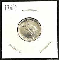 Front of the 1967 Canadian 5 cents coin showing the rabbit design and inscriptions.