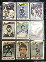 Front view of the 9 O-Pee-Chee NHL trading cards featuring players from Bruins, Maple Leafs, Canadiens, Rockies, Rangers, and Blues.