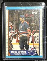 Front side of the 1989-90 Topps Mark Messier Edmonton Oilers hockey trading card showing player in uniform and team logo.