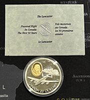 Photo showing the certificate of authenticity titled 'The Lancaster' with bilingual text, and the coin in its protective capsule.