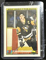 Front of the 1990 Bowman Mario Lemieux Penguins hockey trading card showing player in Penguins uniform and card details.