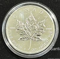 Obverse side of the 1992 Canadian Silver Maple Leaf coin showing the maple leaf and purity markings, in a clear protective case.