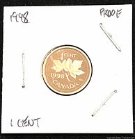 Reverse side of 1998 Canadian 1 cent proof coin showing maple leaf design, denomination and year.