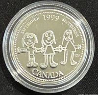 Obverse side of 1999 Canadian silver proof coin showing three children holding hands with inscriptions indicating September 1999 and Canada.