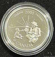 Reverse side of coin depicting elderly man and child with the word 'WISDOM' and date 2000.