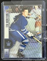 Front side of the 2022-3 Upper Deck Tim Hortons Tim Horton hockey card showing player image and holographic design.