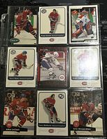 Front view of 9 Montreal Canadiens hockey trading cards featuring various players in team uniforms with branding visible.