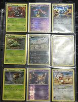 Front view of nine Pokémon cards in sleeves showing artwork and names Scatterbug, Gourgeist, Metang, Cacnea, Vullaby, Kricketot, Nihilego, Meowth, and one card with unclear name.