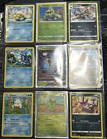 Front side of the 9 different Pokémon collectible trading cards showing the characters and stats.