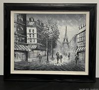 Full view of the framed Paris painting showing the entire artwork and frame.