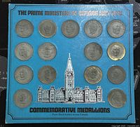 Front view of blue mounting card with 15 medallions depicting Canadian Prime Ministers, titled 'The Prime Ministers of Canada 1867-1970 Commemorative Medallions'