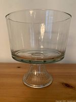Full view of the clear glass trifle pedestal bowl showing its size, shape, and clarity.