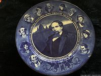 Full view of the Royal Doulton plate displaying Charles Dickens in the center with character portraits around the edge