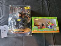 Both items shown together on black surface with seller tag