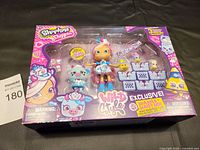 Front view of Shopkins Shopples Wild Style box set with doll and collectible figures in original packaging.