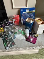 Full view of all bulbs and packaging showing brand variety and bulb types