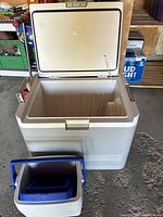 Photo of open large Igloo KoolMate cooler showing interior and small cooler placed in front