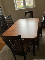 Table and all six chairs assembled with leaf extended