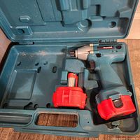 Makita cordless impact wrench with two batteries and hard case