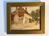 Full view of the framed watercolour painting showing a rural cottage scene with a horse-drawn carriage on the right.