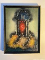 Full front view of framed textured painting with Jewish religious motifs including Torah scroll and tablets, Star of David glowing in red background