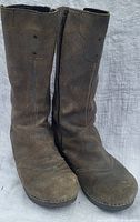 Pair of mid-thigh distressed blue gray suede boots standing upright showing front and side profiles.
