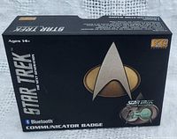 Original box featuring Star Trek The Next Generation branding and Bluetooth Communicator Badge logo.