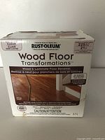 Front view of Rust-Oleum Wood Floor Transformations 3.7 L container showing product name and details.