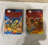 Photo of two Geronimo Stilton books 'The Quest for Paradise' and 'The Kingdom of Fantasy' showing front covers.