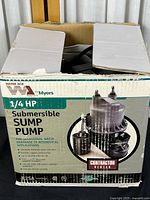 Box of WaterAce submersible sump pump showing brand, power (1/4 HP), and intended use for residential water drainage.