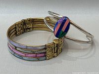 Both bracelets displayed together showing style and relative size