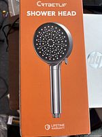 Front of box showing shower head image, brand CRTBetlif, and lifetime warranty.
