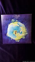Front cover of the Yes 'Fragile' vinyl record with the iconic fragmented globe artwork.