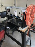 Full front view of portable planner mounted on metal stand