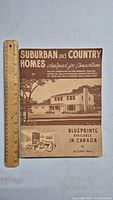Front cover of the 1960s home design catalogue showing title, illustration of a suburban house, and text about blueprint availability in Canada.