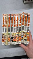 Front view of Naruto manga volumes 11 through 20, showing spines with title, volume number and author.
