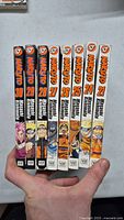 Front view of Naruto manga volumes 21 through 30 spines showing titles, volume numbers, and artwork.