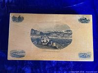 Top view of rectangular wooden Mauchline box with Bournemouth scene decals.