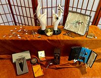 Overview of entire lot on orange cloth with folding screen background