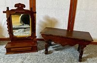 Full view of dresser box with mirror and rustic footstool side by side