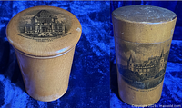 Two small round Mauchline souvenir cases side by side on blue fabric. Left case has etching of 1893 World's Columbian Exposition Administration Building. Right case has image of Inveraray Castle and Dun Quaich.