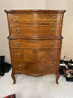Full front view of cherry wood highboy