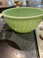 Green ribbed glass mixing bowl