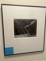 Frontal view of the framed black and white Steven Hays artist's proof print showing the detailed stone vein pattern and black frame.